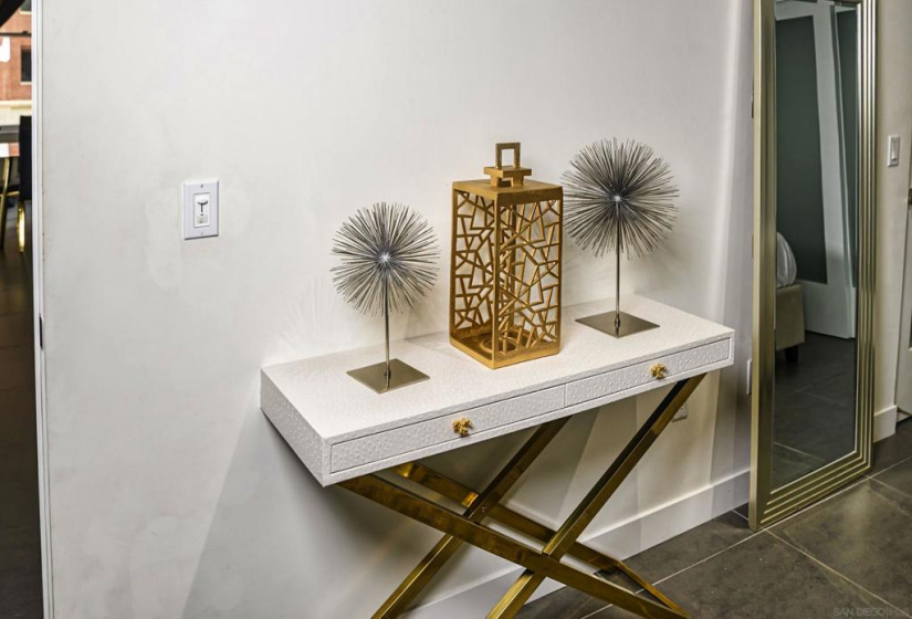 Art decco accents for this console table.